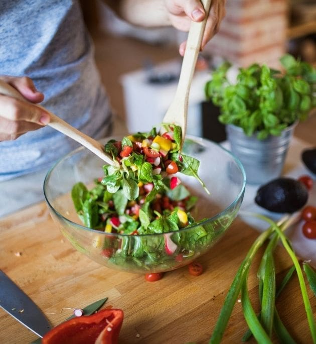 Person enjoying a healthy, balanced meal at home
