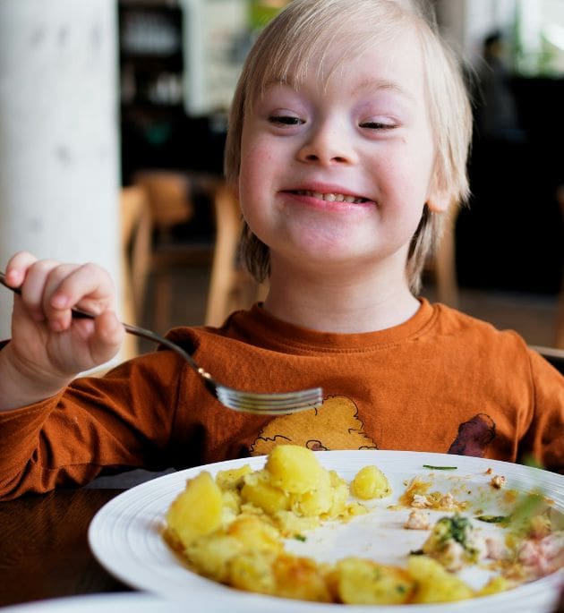 Person enjoying a healthy, balanced meal at home